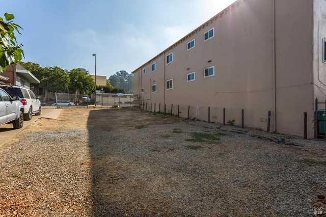 an aerial view of a house with a swimming pool