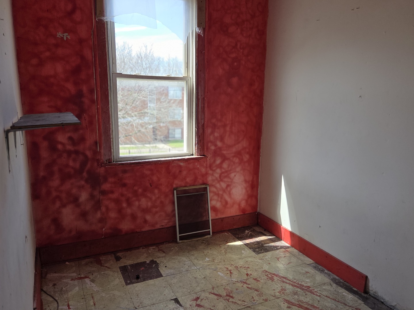 8847 South Burley Avenue Chicago, IL 60617 - Photo 27 of 29 a view of an empty room with a window