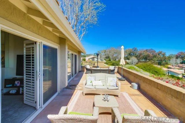 a view of a swimming pool with an outdoor space