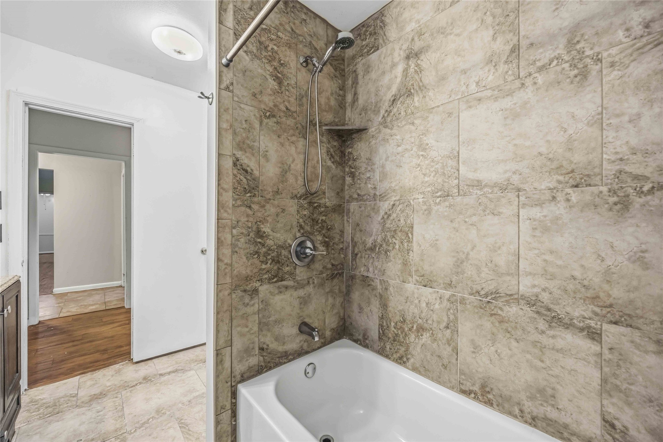 435 Rolling Wood Road Baytown, TX 77520 - Photo 19 of 29 Newly renovated shower tile