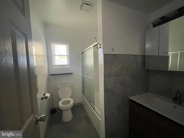 a bathroom with a toilet