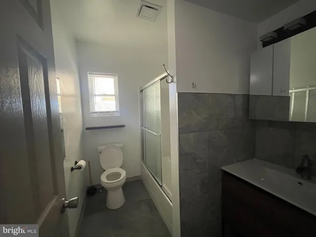 a bathroom with a toilet