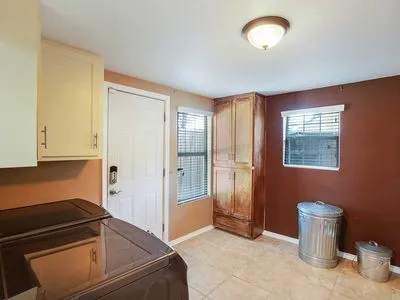 a view of kitchen and utility room