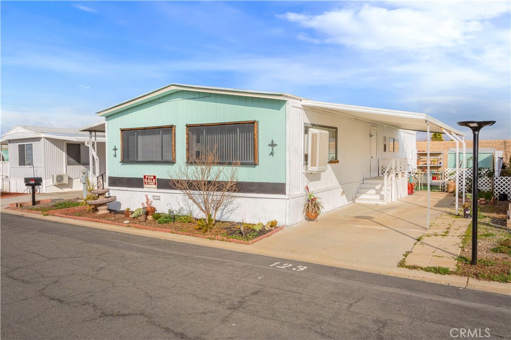 27150 Shadel Road, Unit 123 Menifee, CA 92586 - Photo 1 of 1 a view of a house with entertaining space
