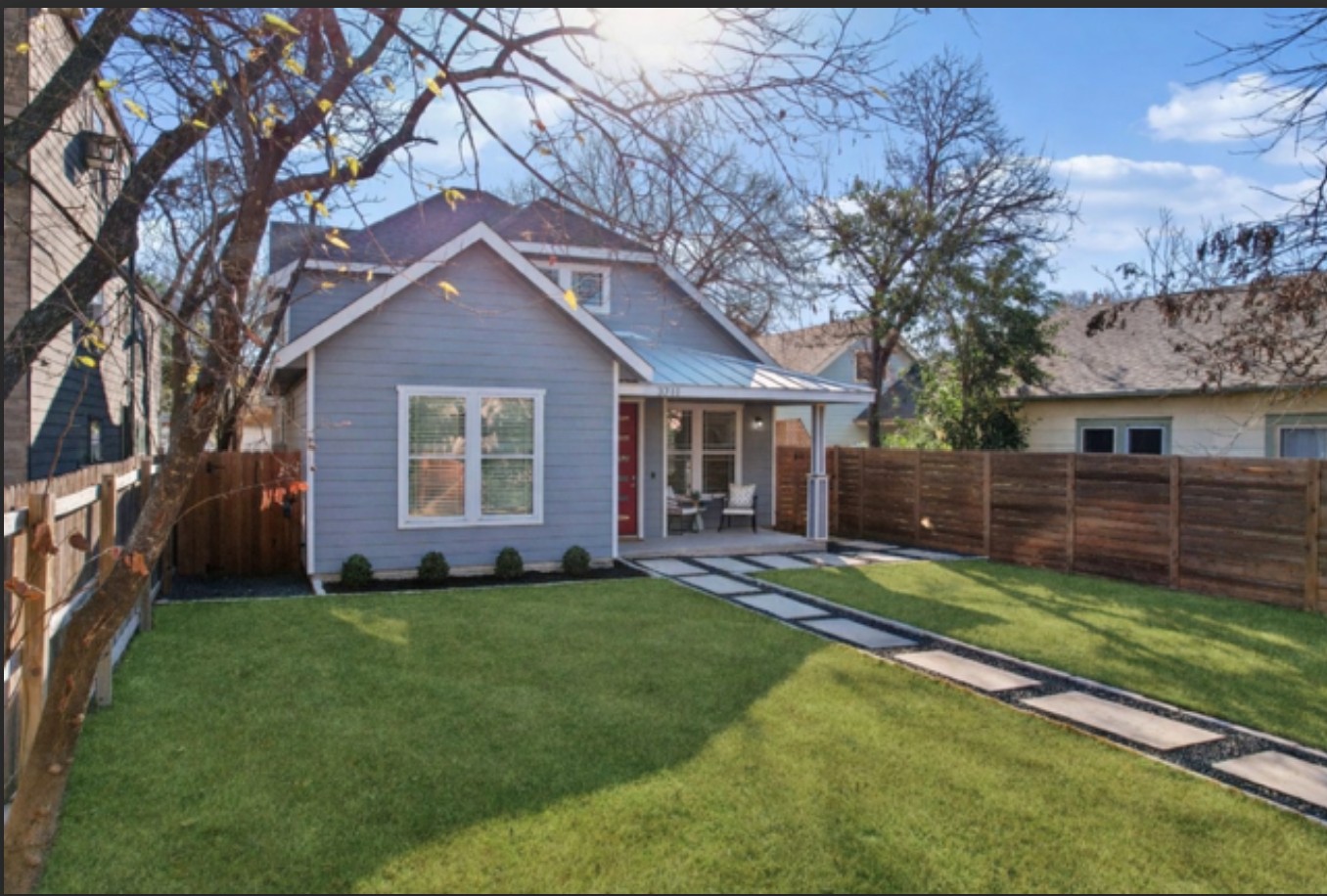 3711 Cedar Street Austin, TX 78705 - Photo 36 of 40 a view of a yard in front of a house with plants and large tree