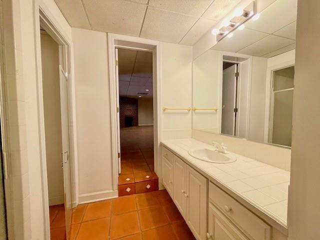 2396 Lavista Road Northeast Atlanta, GA 30329 - Photo 28 of 28 a bathroom with a granite countertop sink and washing machine