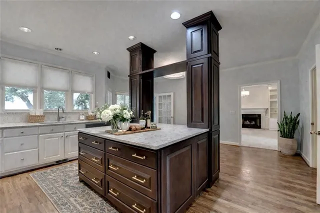 a utility room with sink dryer and washer
