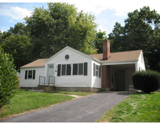 5 Bretton Road Springfield, MA 01119 - Photo 1 of 8 a front view of a house with a garden