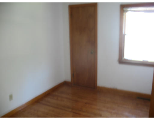 5 Bretton Road Springfield, MA 01119 - Photo 6 of 8 a view of an empty room and a window