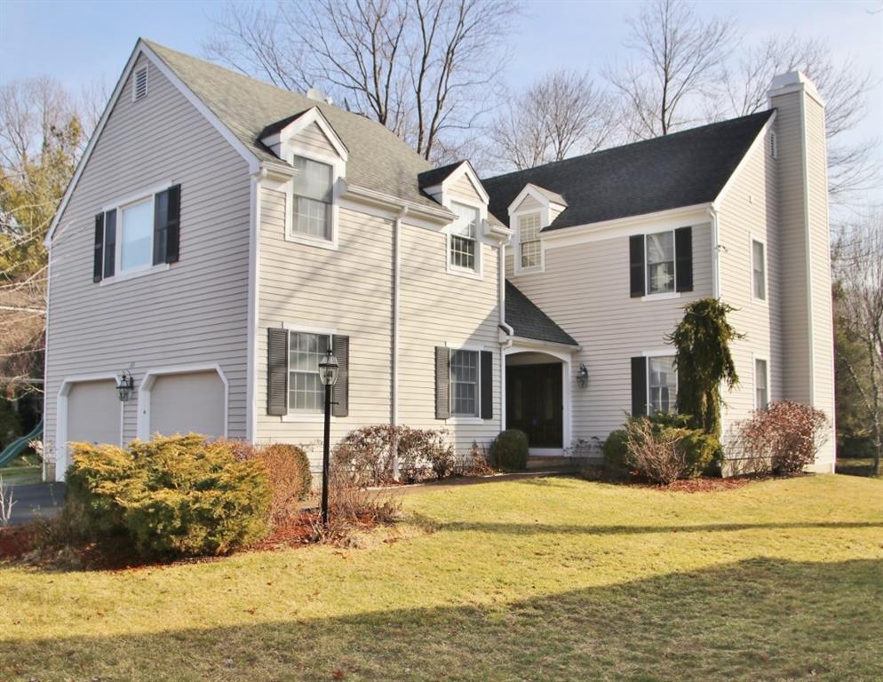 90 Fieldstone Road Stamford, CT 06902 - Photo 1 of 1 a front view of a house with a yard