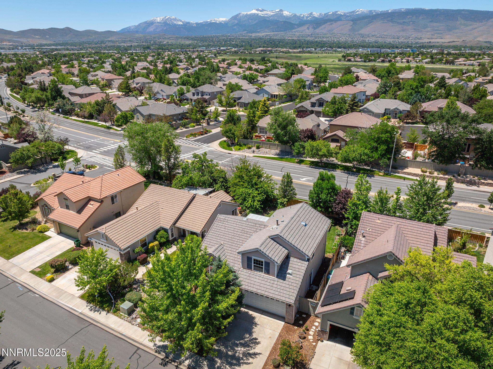 9783 Northrup Drive Reno, NV 89521 - Photo 2 of 39 an aerial view of a house with a garden