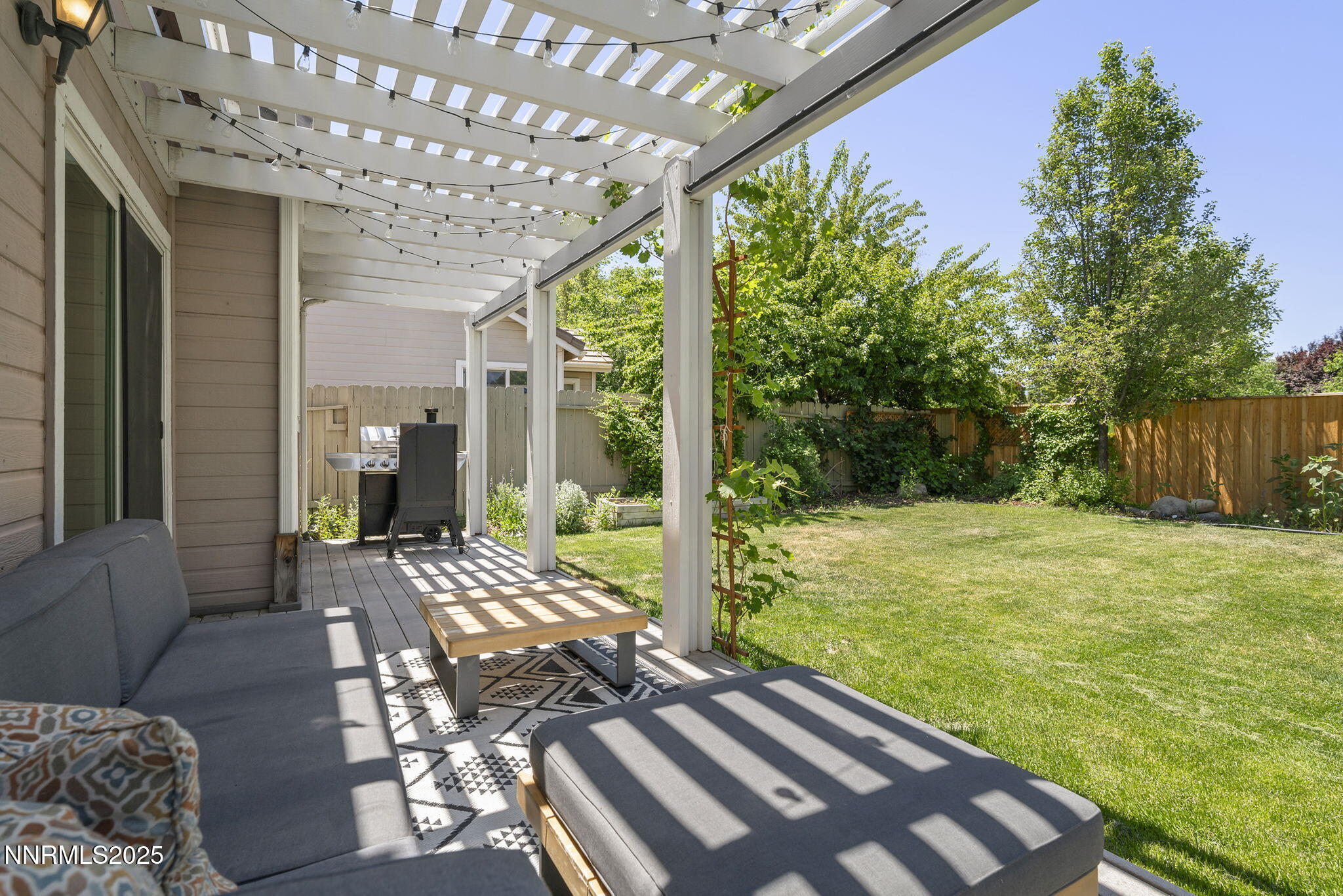 9783 Northrup Drive Reno, NV 89521 - Photo 25 of 39 a view of a patio with wooden floor
