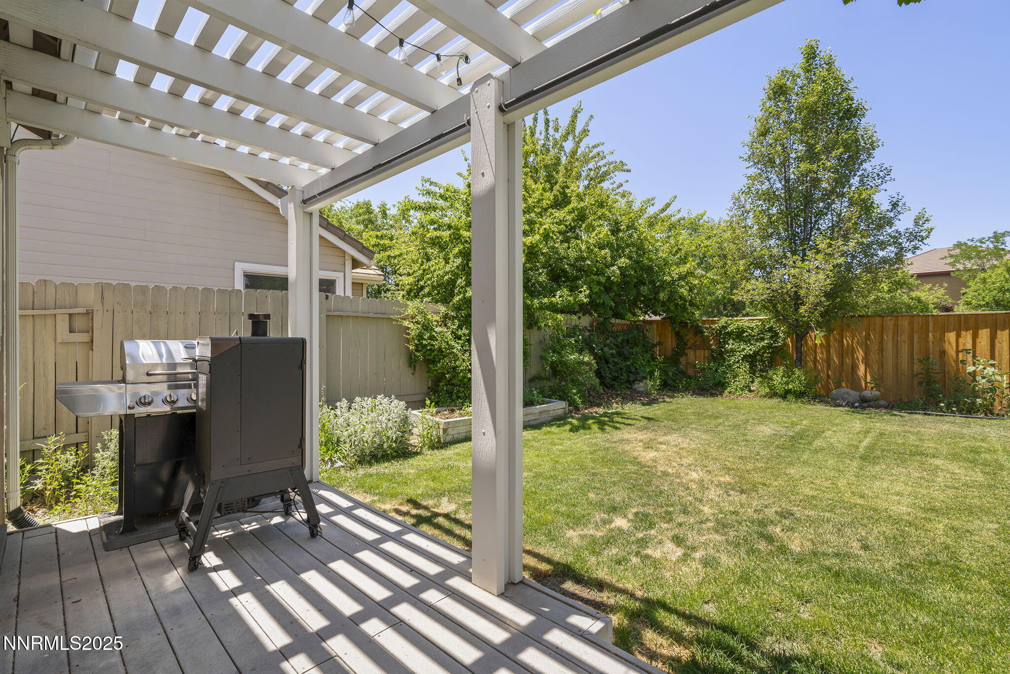 9783 Northrup Drive Reno, NV 89521 - Photo 26 of 39 a view of a porch with furniture and garden