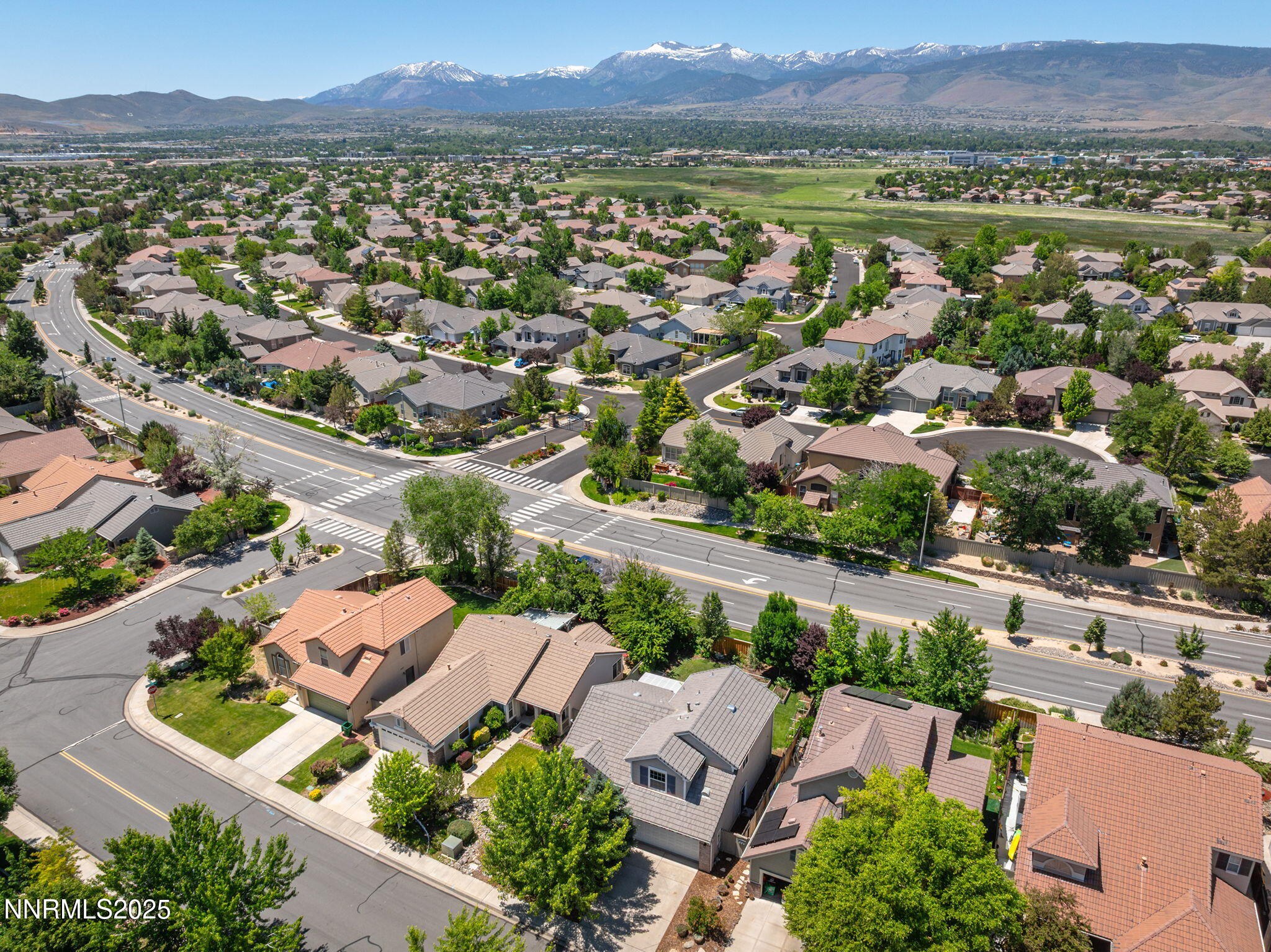 9783 Northrup Drive Reno, NV 89521 - Photo 34 of 39 an aerial view of residential houses with outdoor space
