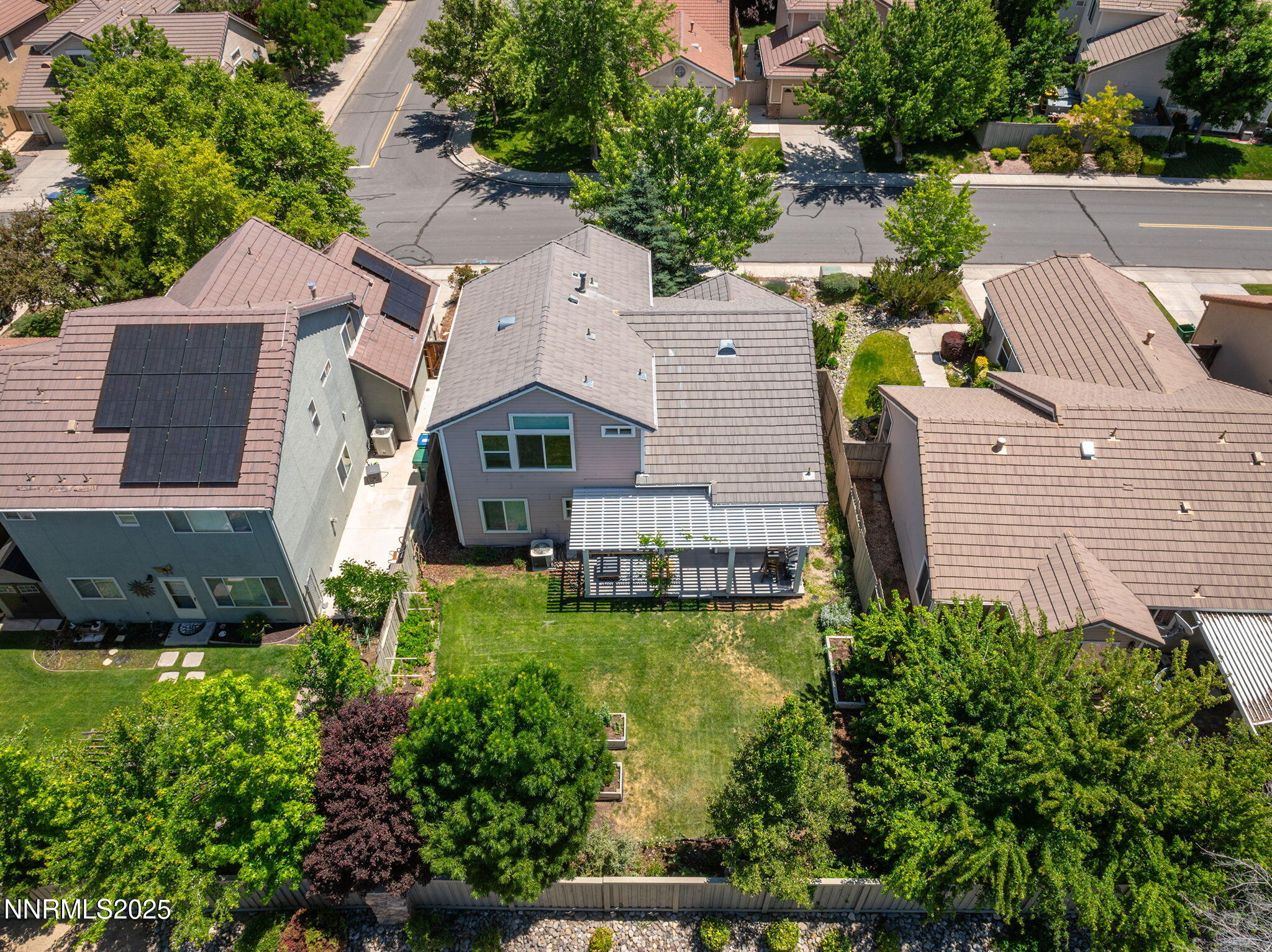 9783 Northrup Drive Reno, NV 89521 - Photo 37 of 39 an aerial view of a house with swimming pool and outdoor seating