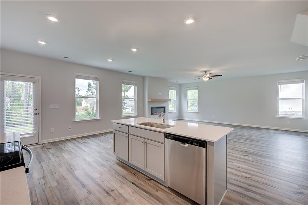 419993 St Anne's Place Covington, GA 30016 - Photo 15 of 30 a kitchen with sink and window