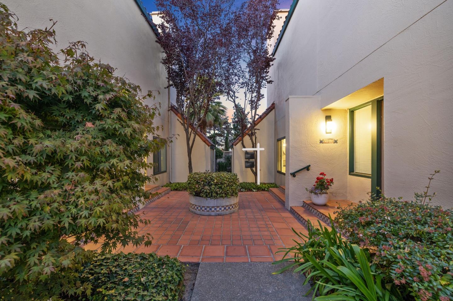 2345 Armada Way San Mateo, CA 94404 - Photo 3 of 32 a front view of a house with garden