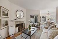 2345 Armada Way San Mateo, CA 94404 - Photo 32 of 32 a living room with furniture a large window and a fireplace