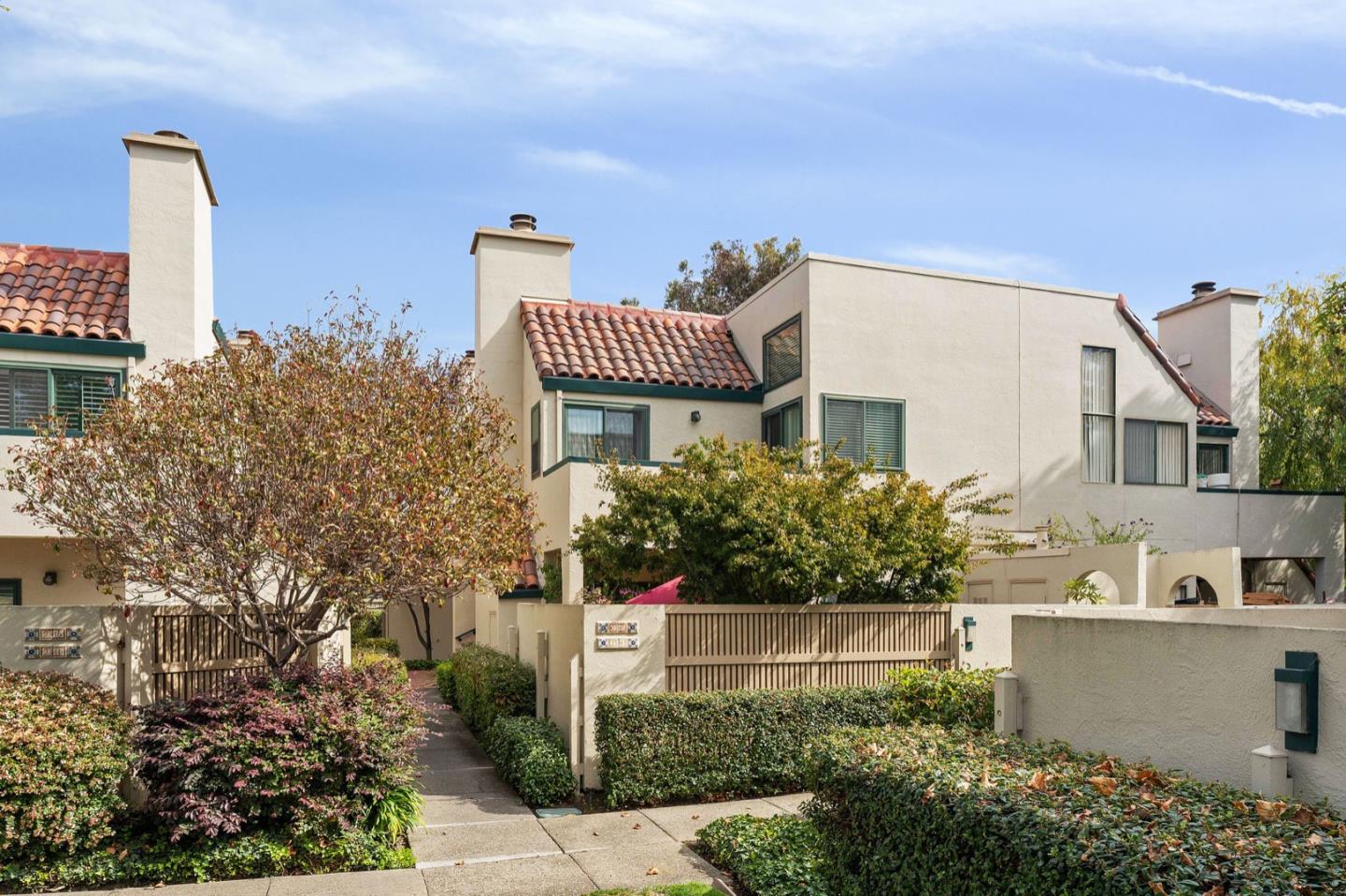 2345 Armada Way San Mateo, CA 94404 - Photo 4 of 32 a front view of a house with a yard
