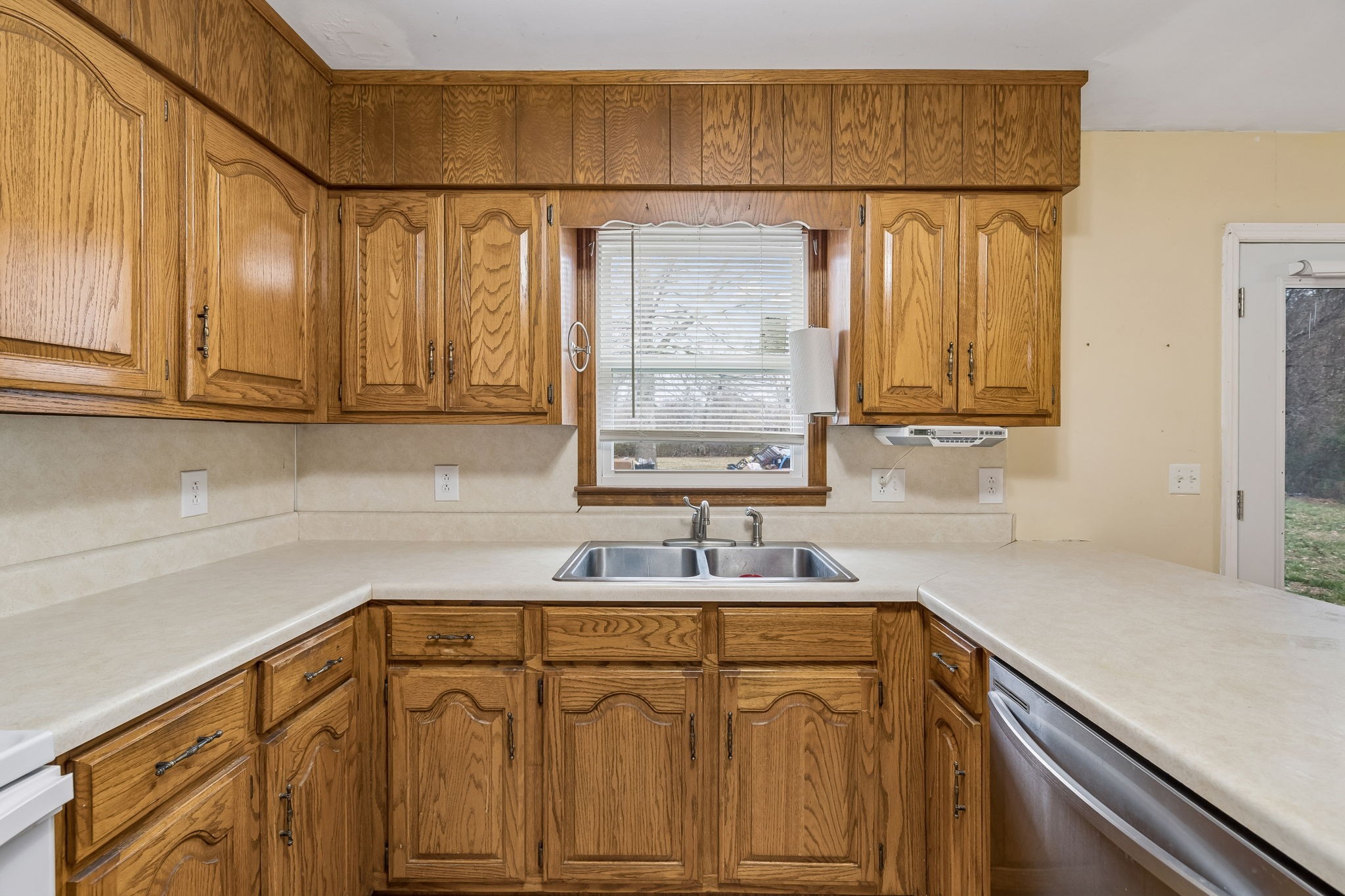 3669 Bluff Springs Road McMinnville, TN 37110 - Photo 19 of 51 a kitchen with a sink and cabinets