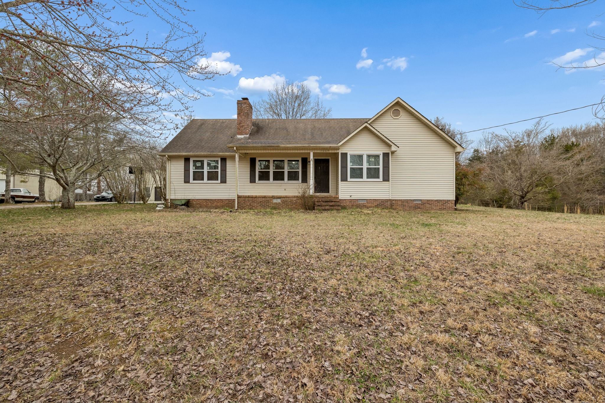 3669 Bluff Springs Road McMinnville, TN 37110 - Photo 2 of 51 a front view of a house with a yard