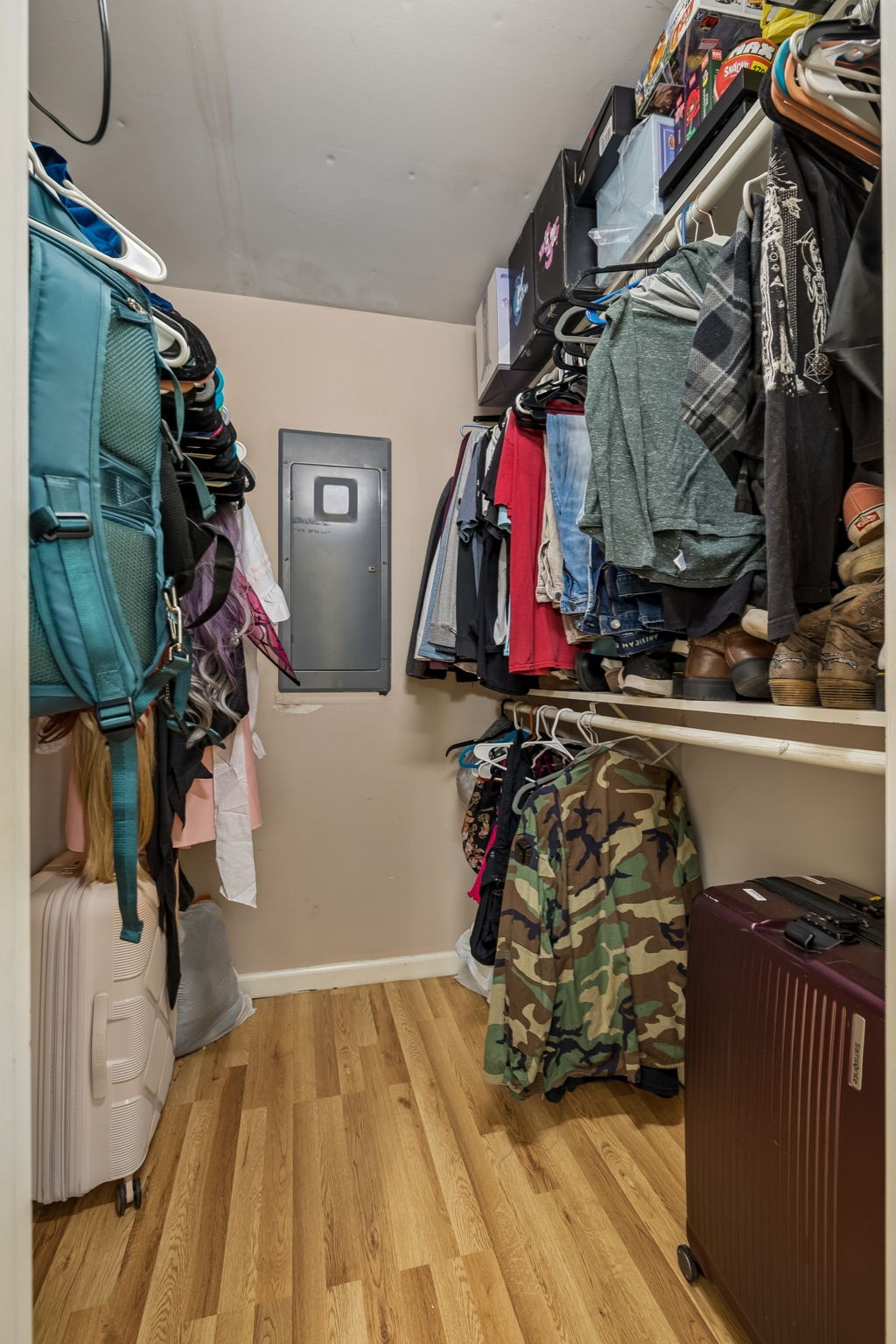 3669 Bluff Springs Road McMinnville, TN 37110 - Photo 27 of 51 a view of walk in closet with clothes and shoes