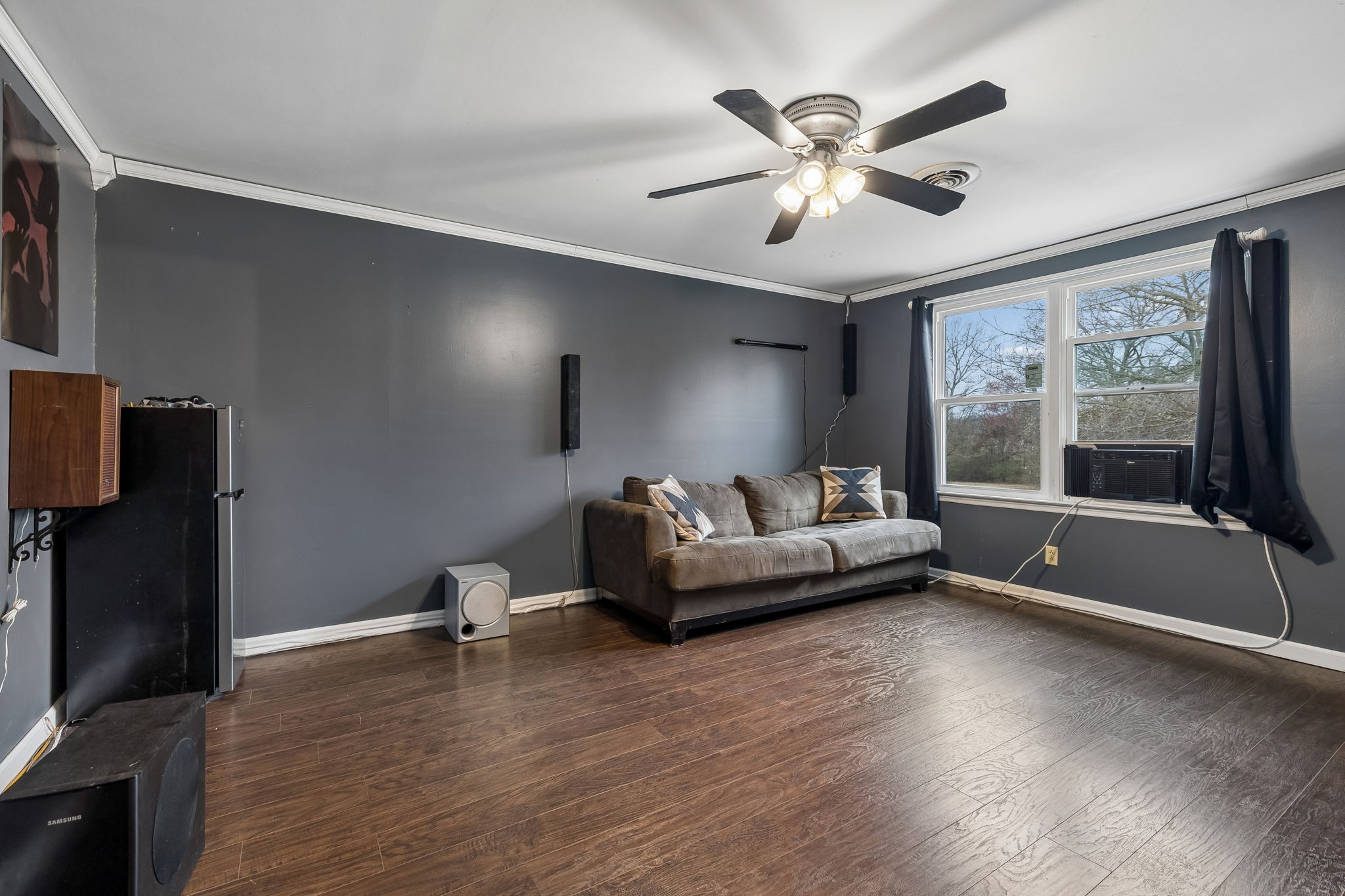 3669 Bluff Springs Road McMinnville, TN 37110 - Photo 31 of 51 a living room with furniture and a large window with wooden floor