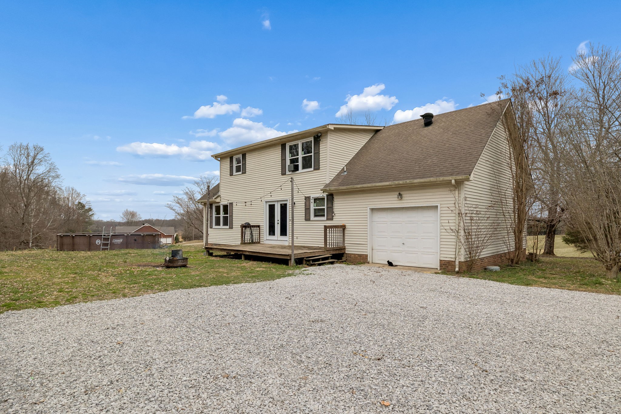 3669 Bluff Springs Road McMinnville, TN 37110 - Photo 36 of 51 a view of a house with a yard and sitting area
