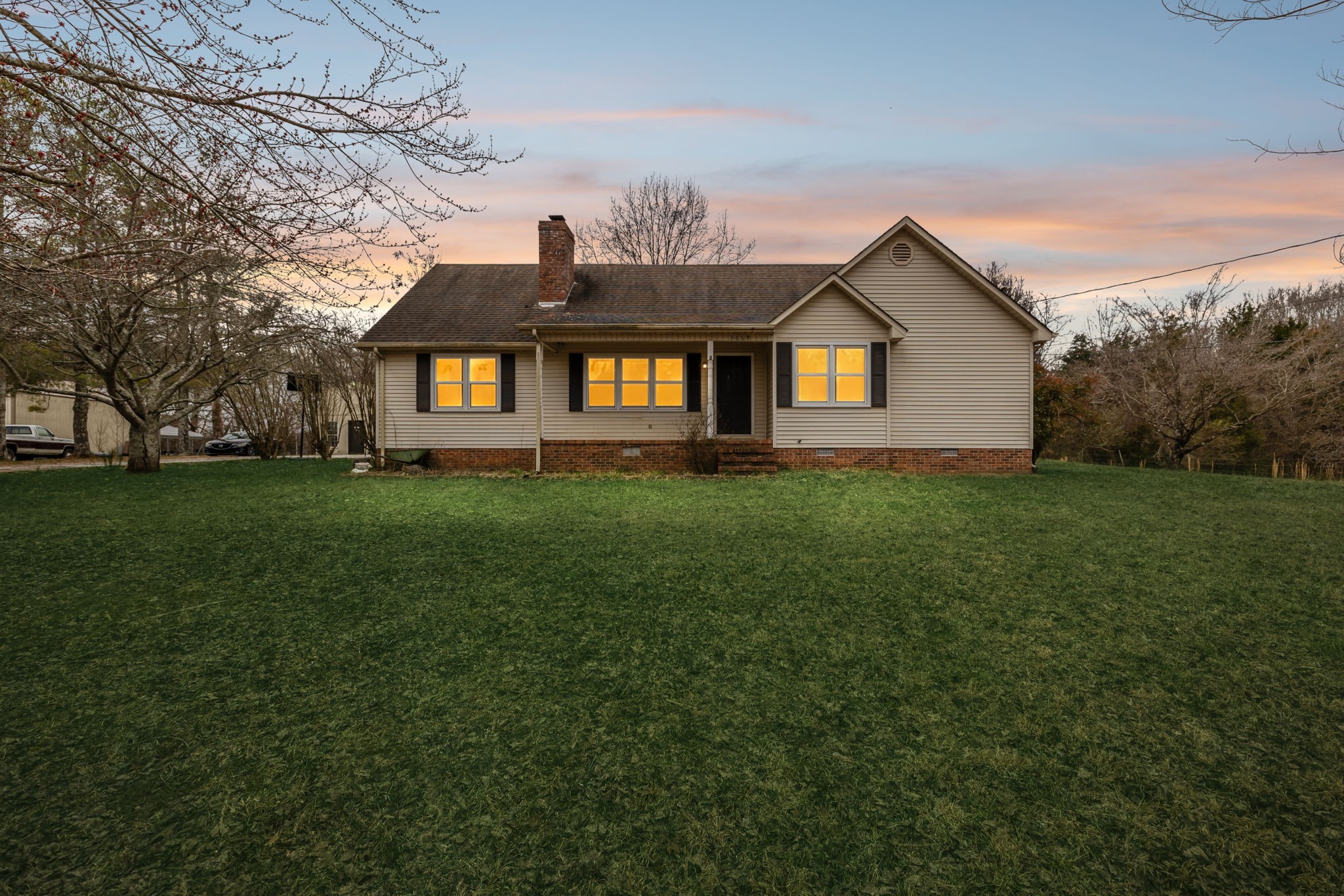 3669 Bluff Springs Road McMinnville, TN 37110 - Photo 49 of 51 a front view of a house with a yard