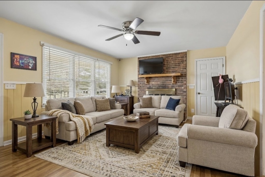 3669 Bluff Springs Road McMinnville, TN 37110 - Photo 10 of 51 a living room with furniture fireplace and a flat screen tv