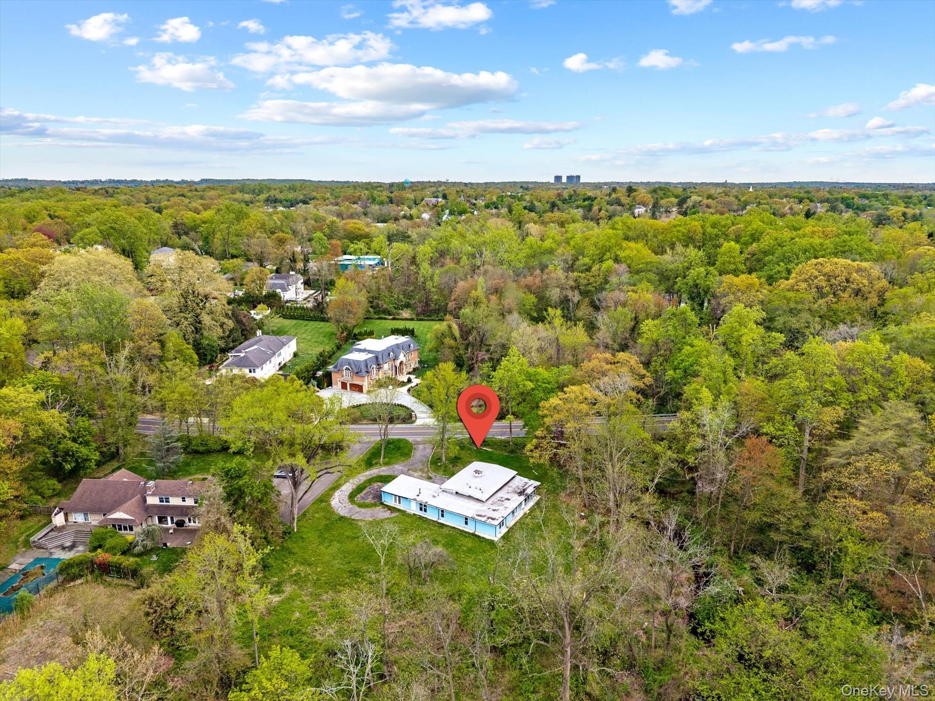 107 Wildwood Road Great Neck, NY 11024 - Photo 2 of 8 a view of city and lake