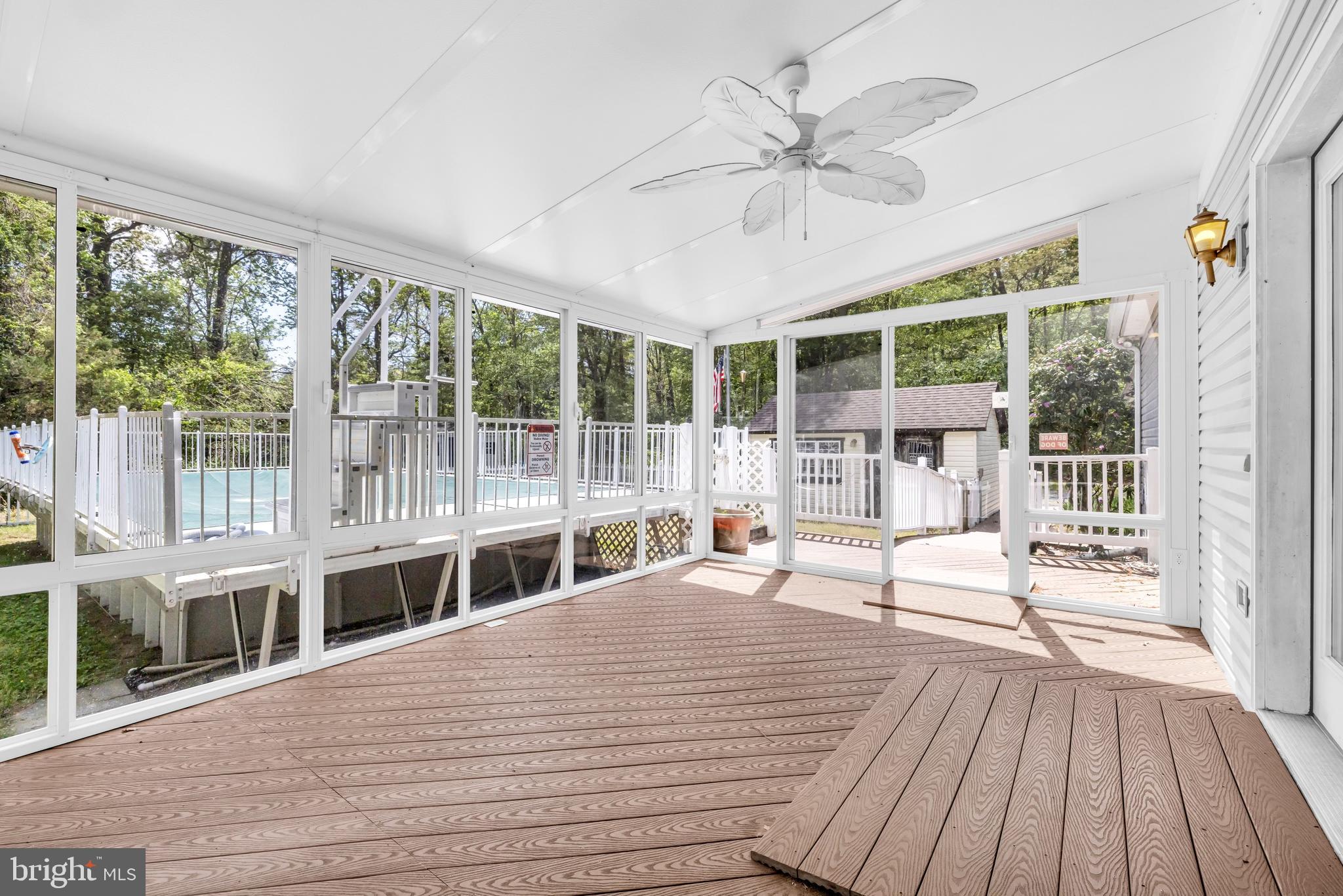 7392 Todds Wharf Road Preston, MD 21655 - Photo 29 of 63 Inside view of large sunroom ramp into home
