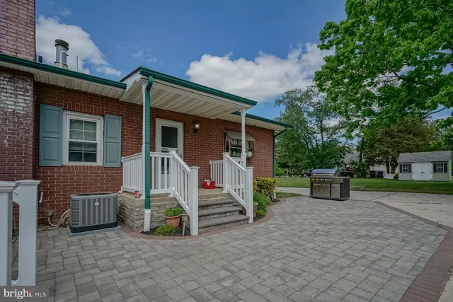 a kitchen with a sink stove and refrigerator