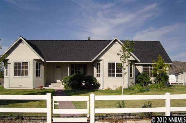 10015 Matterhorn Boulevard Reno, NV 89506 - Photo 1 of 1 front view of house with a yard