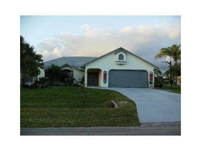 591 Southeast Ron Rico Terrace Port St. Lucie, FL 34983 - Photo 1 of 3 Exterior Front