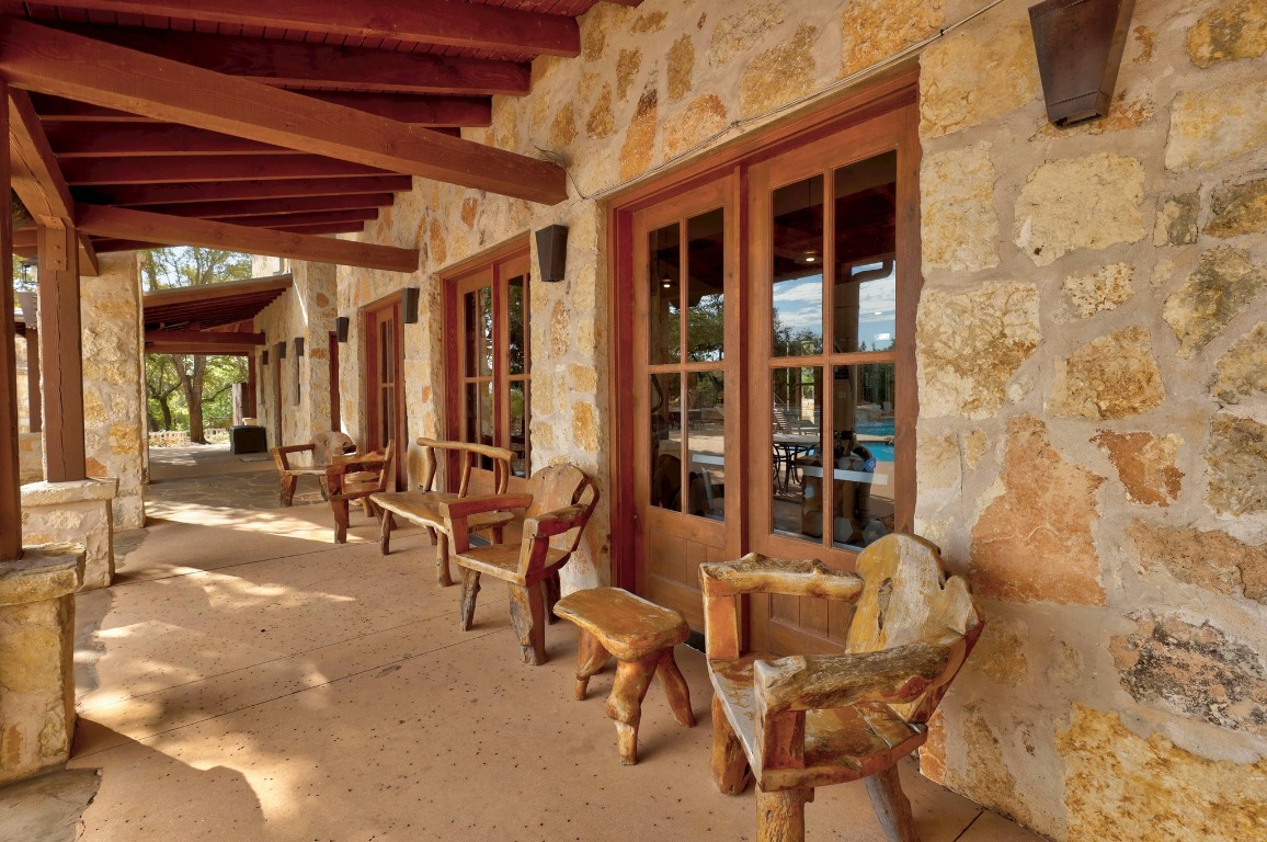 6909 Sunset Ridge Way Jonestown, TX 78645 - Photo 27 of 40 a view of a room with chairs and tables