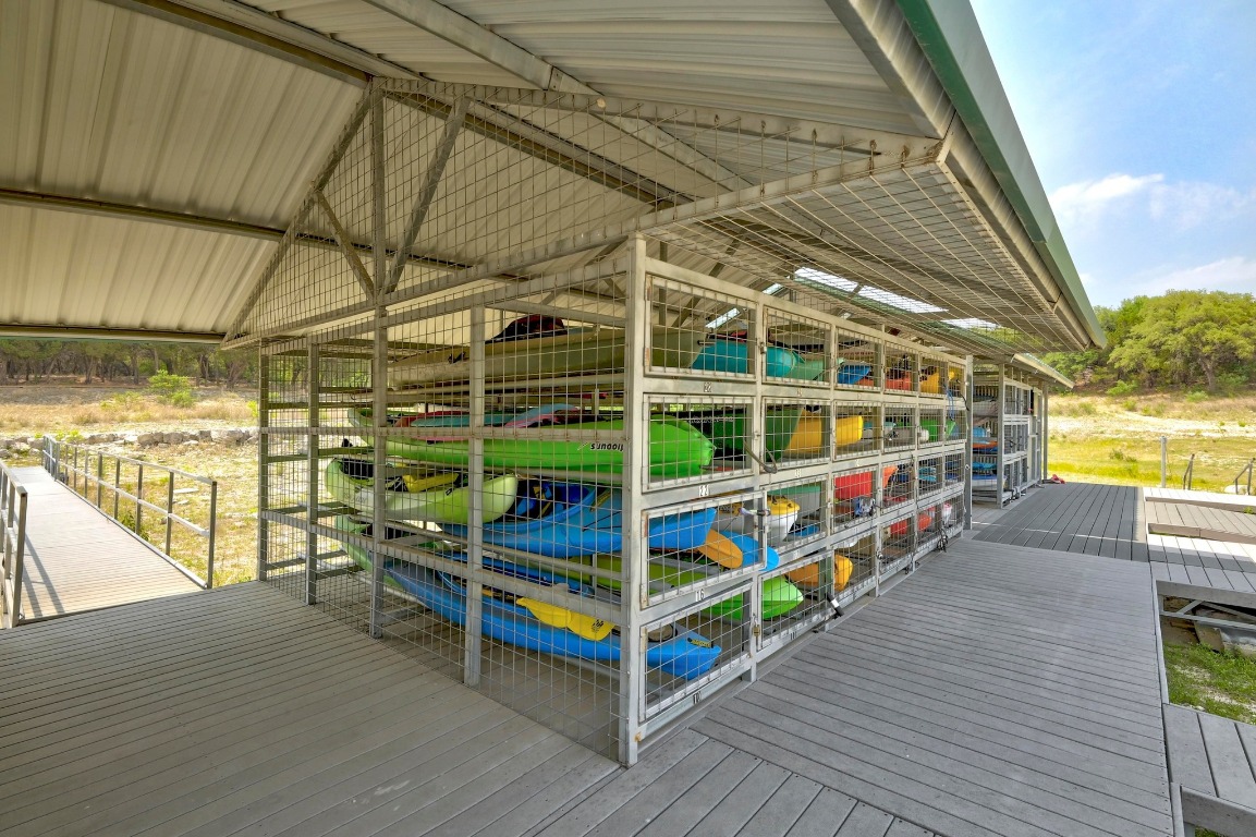 6909 Sunset Ridge Way Jonestown, TX 78645 - Photo 38 of 40 a view of an empty room with wooden floor