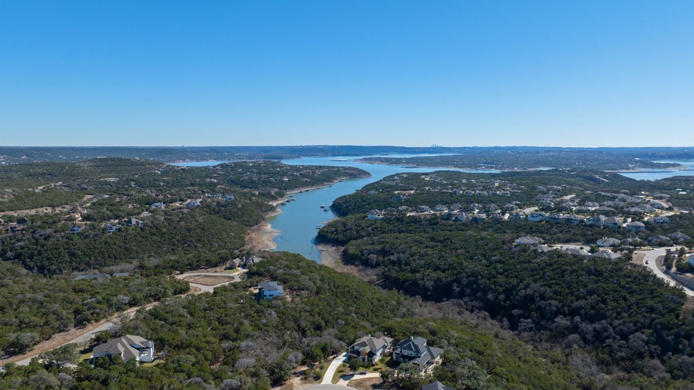 6909 Sunset Ridge Way Jonestown, TX 78645 - Photo 8 of 40 an aerial view of multiple house