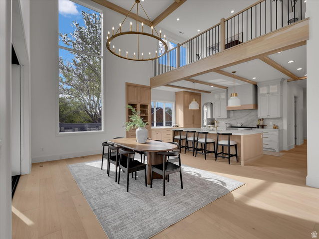 13216 Telemark Lane Draper, UT 84020 - Photo 6 of 41 Dining area with light wood-style flooring and suspended lighting