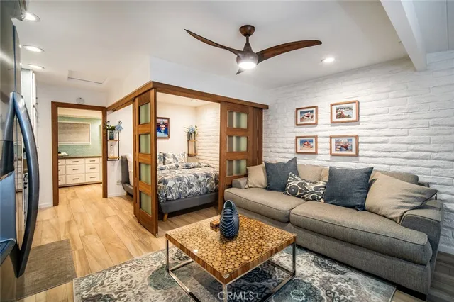 a living room with furniture and a window