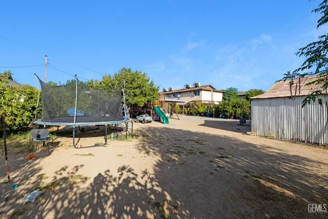 a view of a house with entertaining space