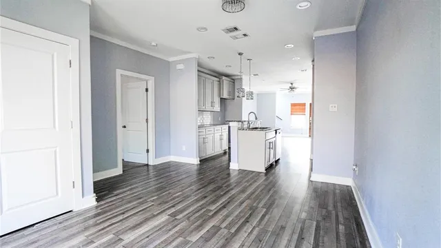 a view of kitchen with wooden floor