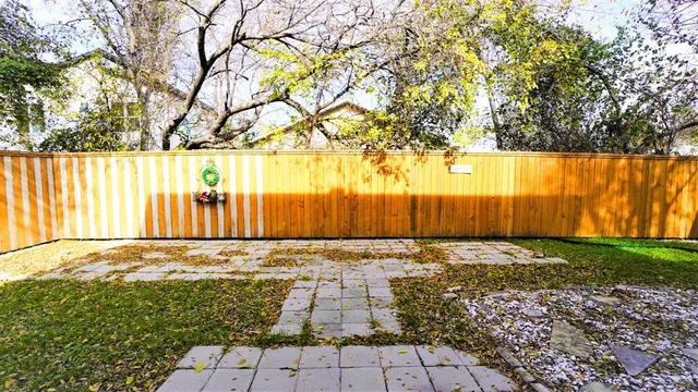 a view of a yard with an trees