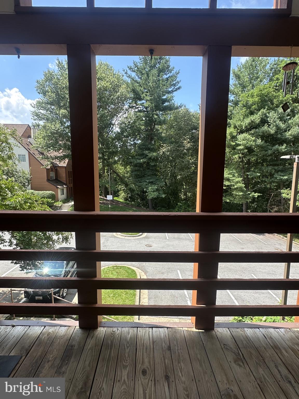 4916 Columbia Road, Unit 3 Columbia, MD 21044 - Photo 9 of 20 Serene balcony view of lush greenery.