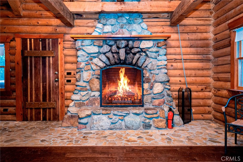 a view of a fireplace with wooden floor