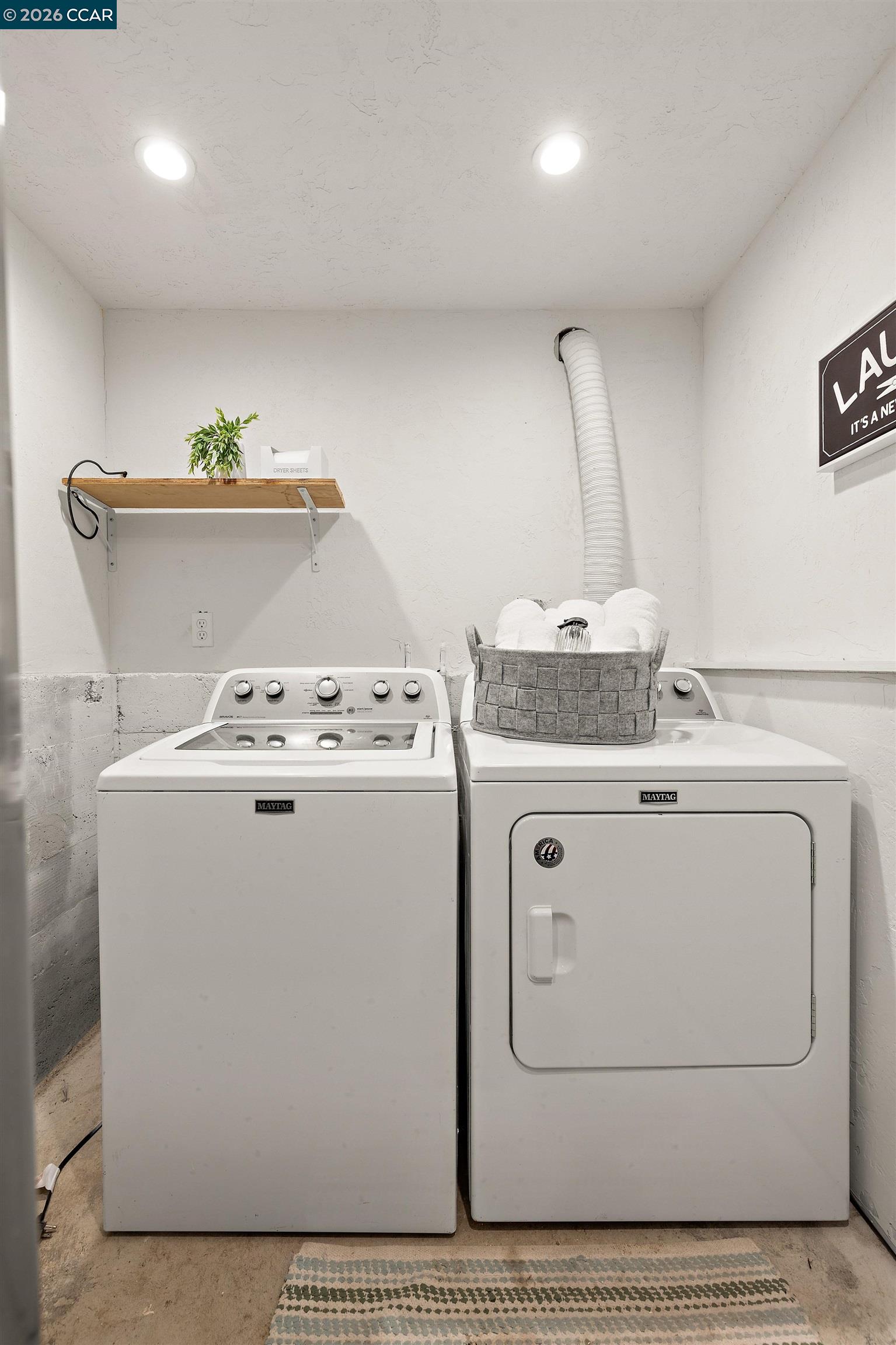 85 Ardmore Road Kensington, CA 94707 - Photo 42 of 45 a utility room with dryer and washer