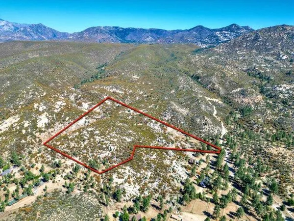 a view of an outdoor space and a mountain