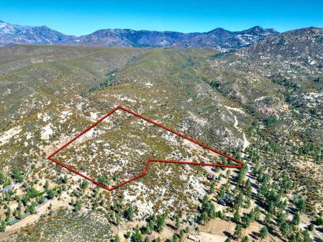 a view of an outdoor space and a mountain