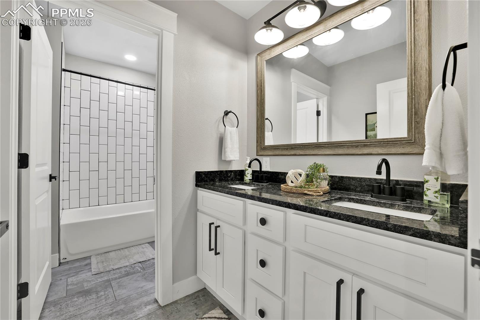 18135 Spur Ranch Road Peyton, CO 80831 - Photo 29 of 50 Full bathroom double sinks, granite