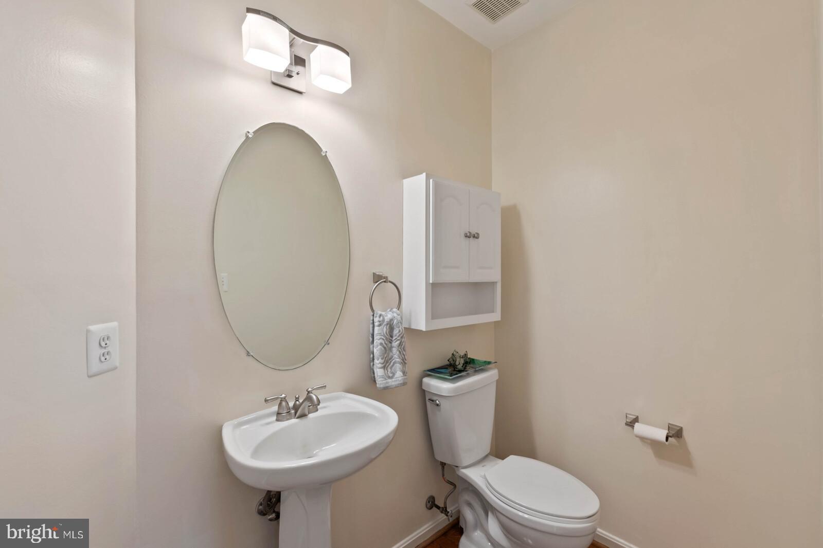 9240 Lorton Valley Road Lorton, VA 22079 - Photo 21 of 35 Updated commode, light, cabinet